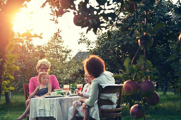Residents and family enjoying the garden at The Croft